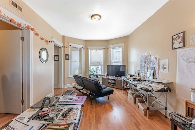 4026 N Kimball Ave, Chicago, IL 60618 - office space featuring visible vents, baseboards, and light wood finished floors