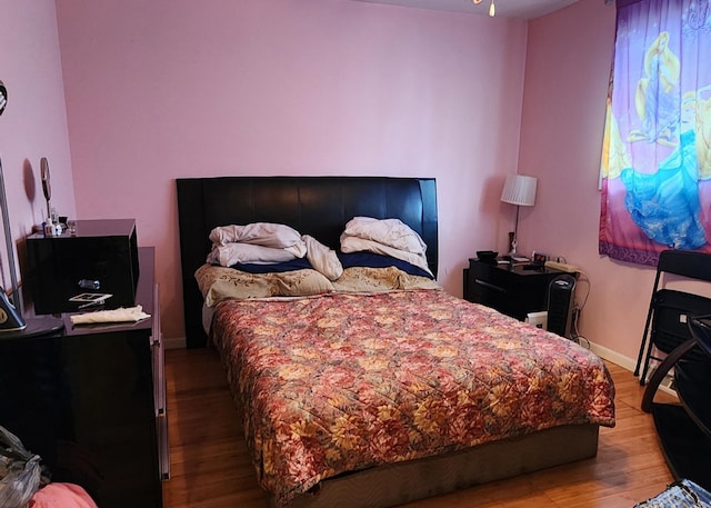 18454 Ridgewood Ave, Lansing, IL 60438 - bedroom with wood finished floors and baseboards