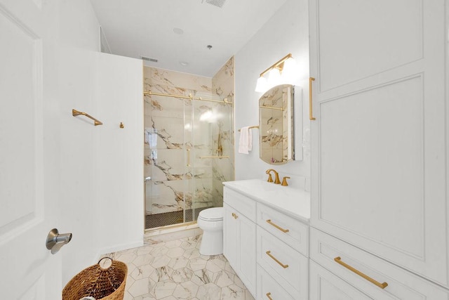 bathroom with visible vents, a marble finish shower, vanity, and toilet