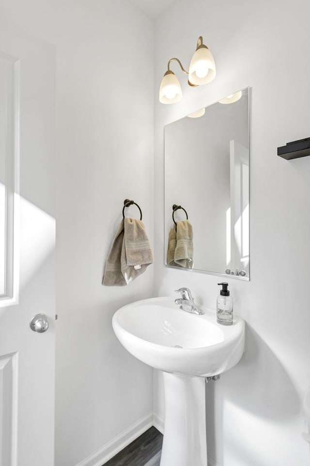 bathroom featuring wood finished floors