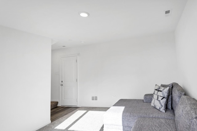 bedroom featuring recessed lighting, visible vents, and wood finished floors