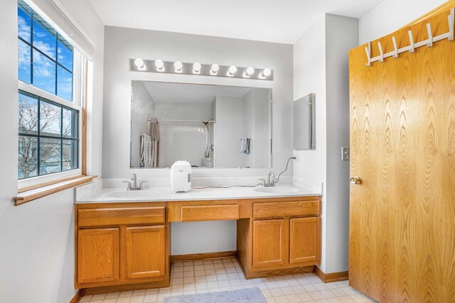 8411 Kirby Dr, Tinley Park, IL 60487 - full bath with a wealth of natural light, double vanity, and a sink