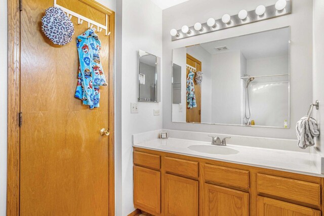 8411 Kirby Dr, Tinley Park, IL 60487 - bathroom with vanity and a shower with curtain