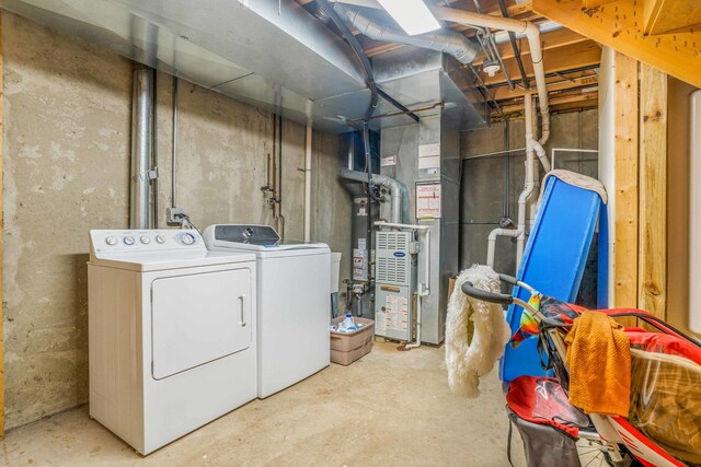 8411 Kirby Dr, Tinley Park, IL 60487 - unfinished basement featuring washing machine and clothes dryer and heating unit