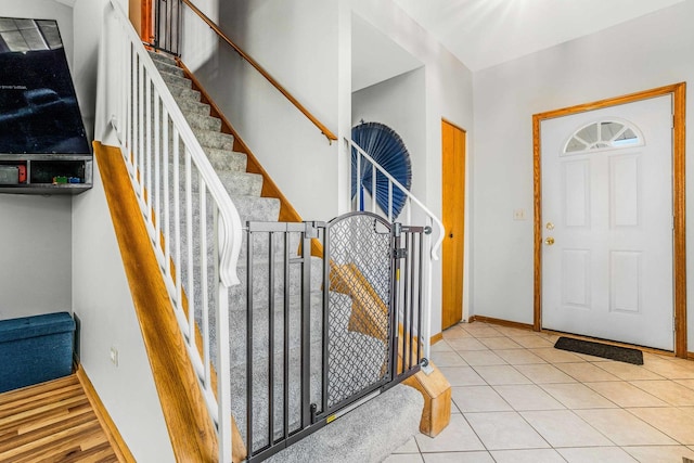 8411 Kirby Dr, Tinley Park, IL 60487 - tiled foyer entrance with baseboards and stairway