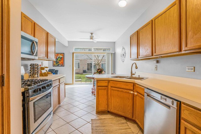 8411 Kirby Dr, Tinley Park, IL 60487 - kitchen featuring a sink, light countertops, ceiling fan, and stainless steel appliances