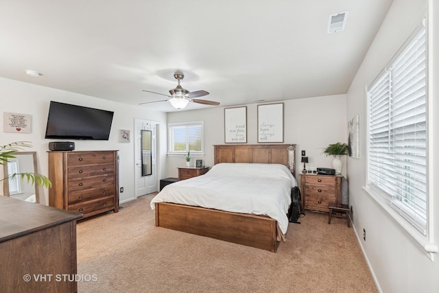 bedroom featuring visible vents, carpet, ceiling fan, and baseboards