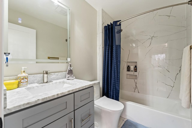 full bathroom featuring toilet, vanity, and shower / bath combo with shower curtain