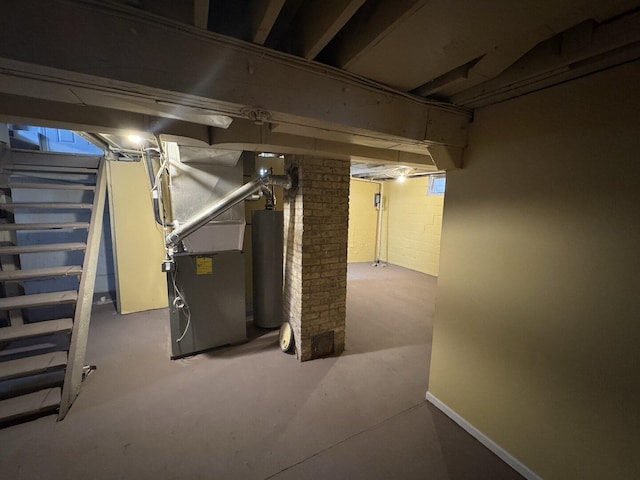 below grade area with heating unit and stairway
