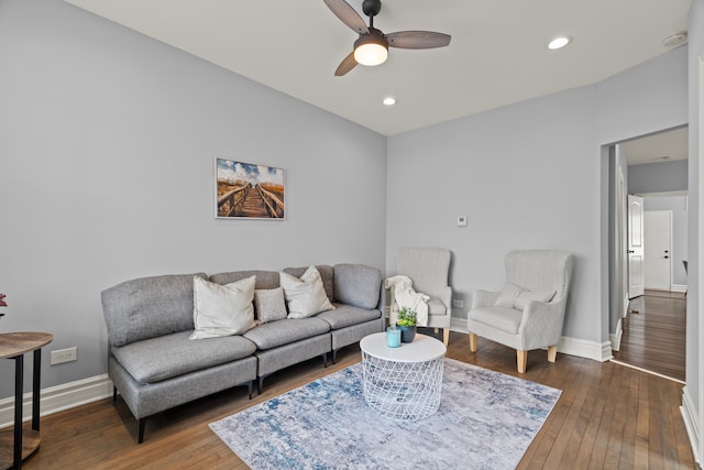 living area featuring ceiling fan, baseboards, recessed lighting, and hardwood / wood-style flooring