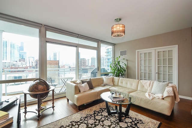 757 N Orleans St Unit 1004, Chicago, IL 60654 - living area with a skyline view and dark wood-style flooring