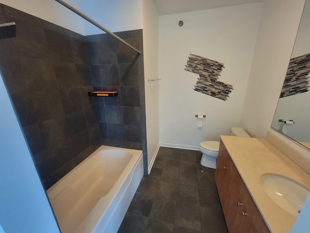 757 N Orleans St Unit 1004, Chicago, IL 60654 - bathroom featuring vanity, toilet, tile patterned flooring, washtub / shower combination, and baseboards