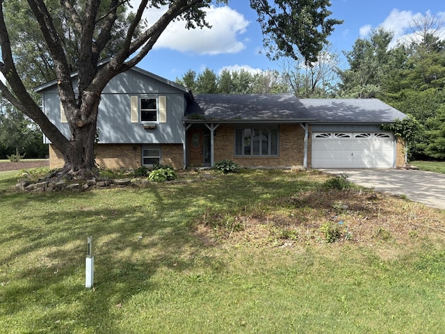 6092 Torch Lite Trl, Loves Park, IL 61111 - tri-level home featuring brick siding, an attached garage, driveway, and a front yard
