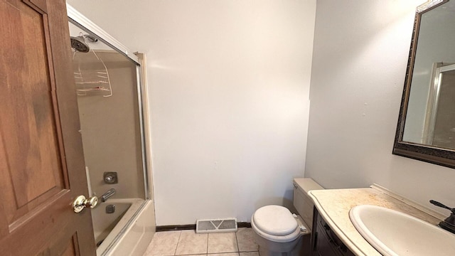 6092 Torch Lite Trl, Loves Park, IL 61111 - full bathroom featuring vanity, tile patterned flooring, and shower / bath combination with glass door