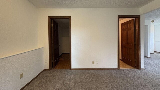 6092 Torch Lite Trl, Loves Park, IL 61111 - carpeted spare room with a textured ceiling and a textured wall