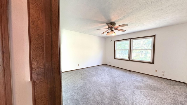 6092 Torch Lite Trl, Loves Park, IL 61111 - empty room featuring a ceiling fan, carpet floors, and a textured ceiling