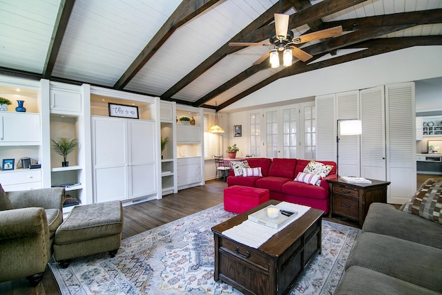 living room featuring vaulted ceiling with beams, wood finished floors, and a ceiling fan