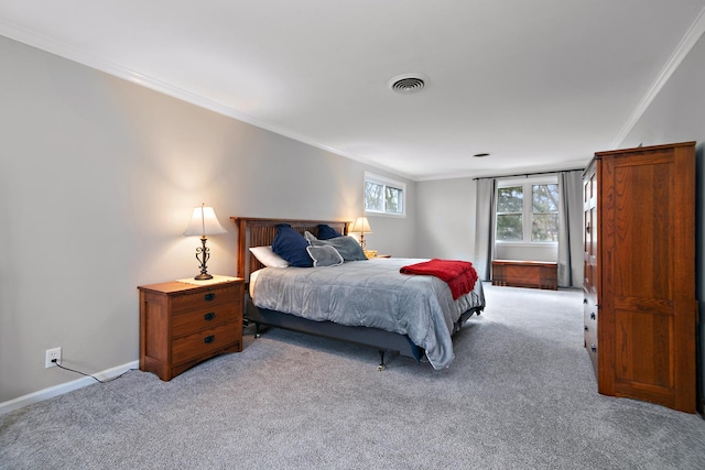bedroom featuring baseboards, visible vents, crown molding, and light colored carpet