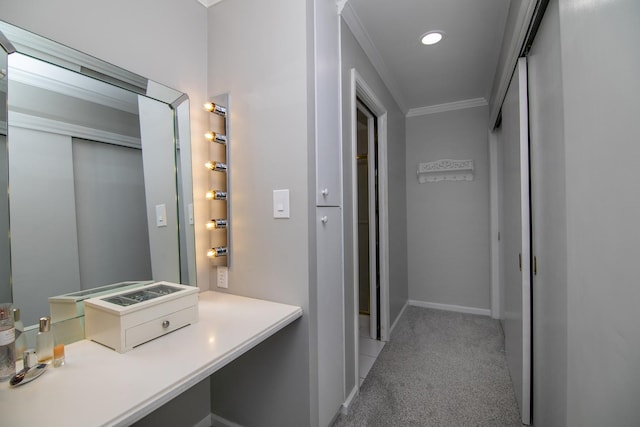 bathroom featuring baseboards, recessed lighting, and ornamental molding