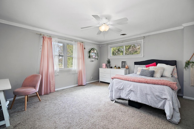 bedroom featuring baseboards, carpet floors, and crown molding