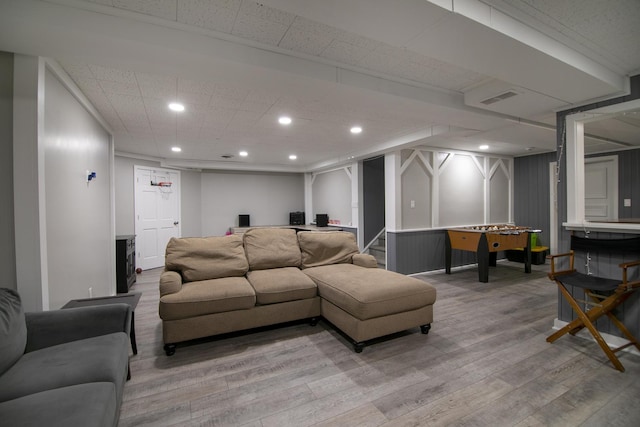 living area featuring recessed lighting, visible vents, and light wood-style flooring