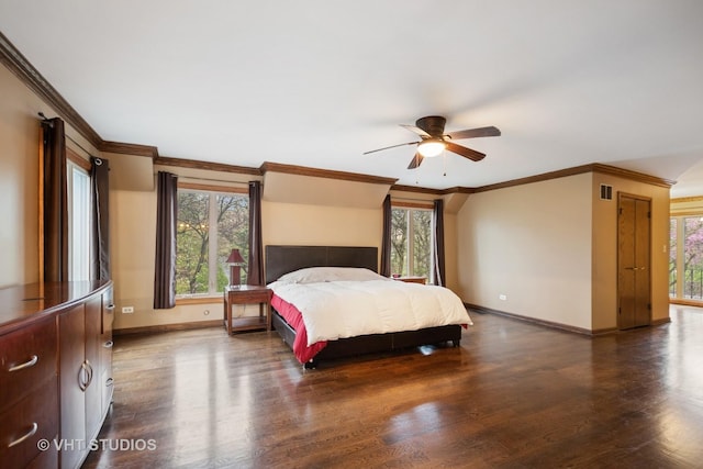 bedroom with ceiling fan, visible vents, dark wood finished floors, baseboards, and ornamental molding