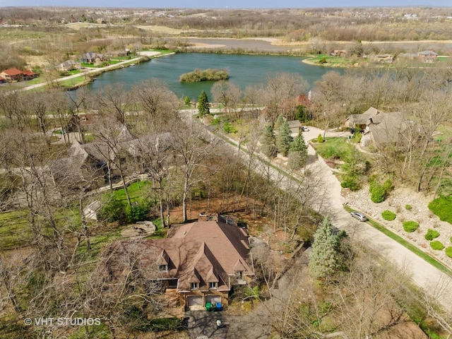bird's eye view with a water view