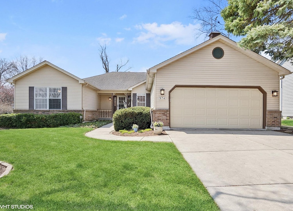 974 Lockwood Ln, Batavia, IL 60510 - ranch-style house with a front lawn, roof with shingles, an attached garage, driveway, and brick siding