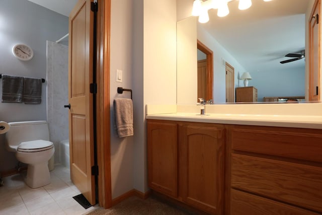 bathroom featuring vanity, toilet, a ceiling fan, and tile patterned floors