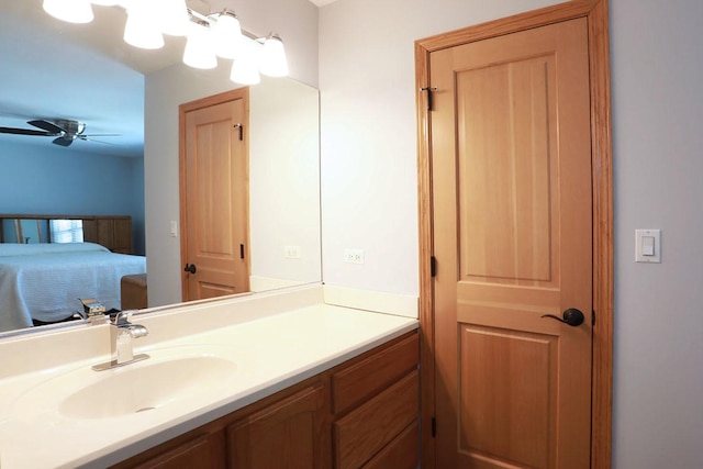 bathroom featuring vanity and ceiling fan