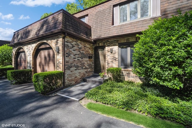 1767 Jefferson Ave, Glenview, IL 60025 - entrance to property with mansard roof and brick siding