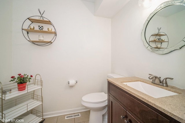 1767 Jefferson Ave, Glenview, IL 60025 - bathroom featuring vanity, visible vents, toilet, tile patterned floors, and baseboards