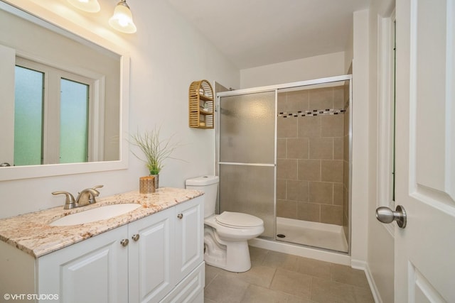 1767 Jefferson Ave, Glenview, IL 60025 - full bathroom with toilet, a stall shower, vanity, and tile patterned flooring