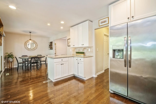 1767 Jefferson Ave, Glenview, IL 60025 - kitchen featuring stainless steel fridge with ice dispenser, dark wood-style flooring, light stone counters, a peninsula, and white cabinetry
