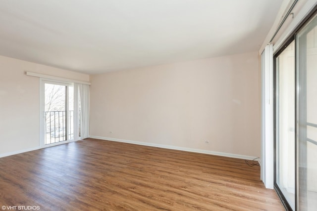 2287 Country Club Dr Unit 21A, Woodridge, IL 60517 - spare room with light wood-style floors and baseboards