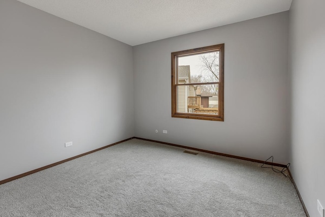 1097 Washington St, Bartlett, IL 60103 - carpeted empty room with baseboards