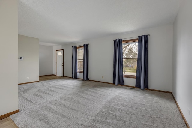 1097 Washington St, Bartlett, IL 60103 - empty room with carpet and baseboards
