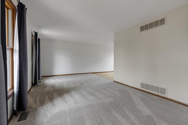 1097 Washington St, Bartlett, IL 60103 - unfurnished room with light colored carpet and baseboards