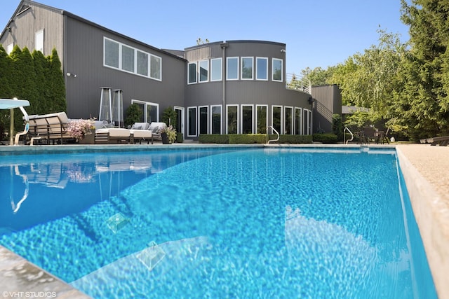 96 Harbor St, Glencoe, IL 60022 - pool with a forest view, a diving board, and a patio area