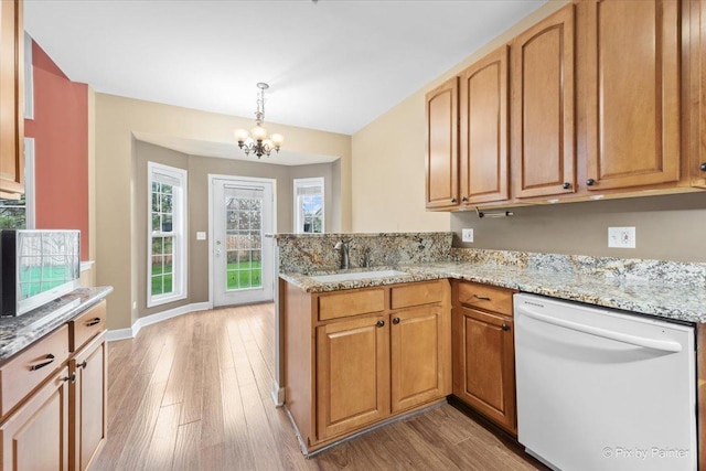 2097 Ivy Ridge Dr Unit 2097, Hoffman Estates, IL 60192 - kitchen featuring light wood finished floors, a sink, a chandelier, white dishwasher, and a peninsula