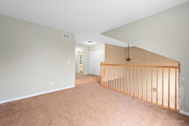 2097 Ivy Ridge Dr Unit 2097, Hoffman Estates, IL 60192 - spare room featuring baseboards, visible vents, a ceiling fan, and carpet