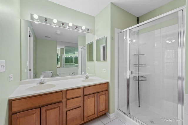 2097 Ivy Ridge Dr Unit 2097, Hoffman Estates, IL 60192 - full bathroom with tile patterned floors, a stall shower, double vanity, and a sink