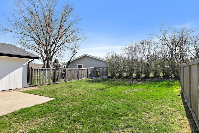 view of yard featuring a fenced backyard