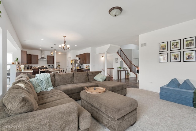 living room with carpet floors, a chandelier, stairway, recessed lighting, and baseboards