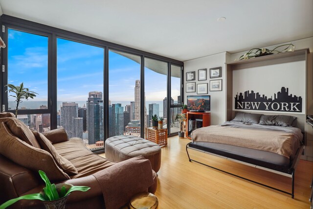 225 N Columbus Dr Unit 5305, Chicago, IL 60601 - bedroom featuring light wood-style flooring and expansive windows