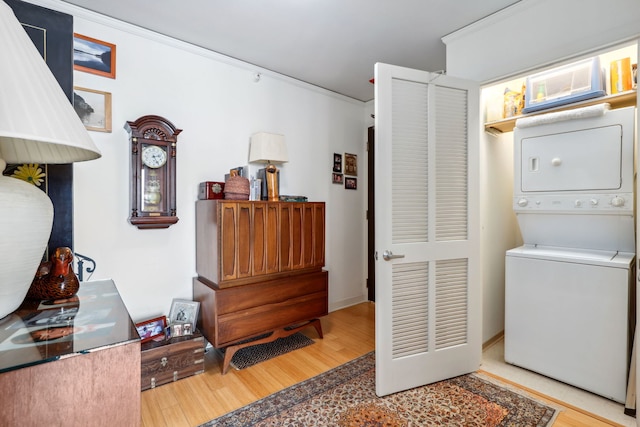 225 N Columbus Dr Unit 5305, Chicago, IL 60601 - clothes washing area featuring stacked washer / drying machine and wood finished floors