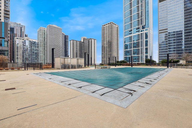 225 N Columbus Dr Unit 5305, Chicago, IL 60601 - community pool featuring a view of skyline and fence