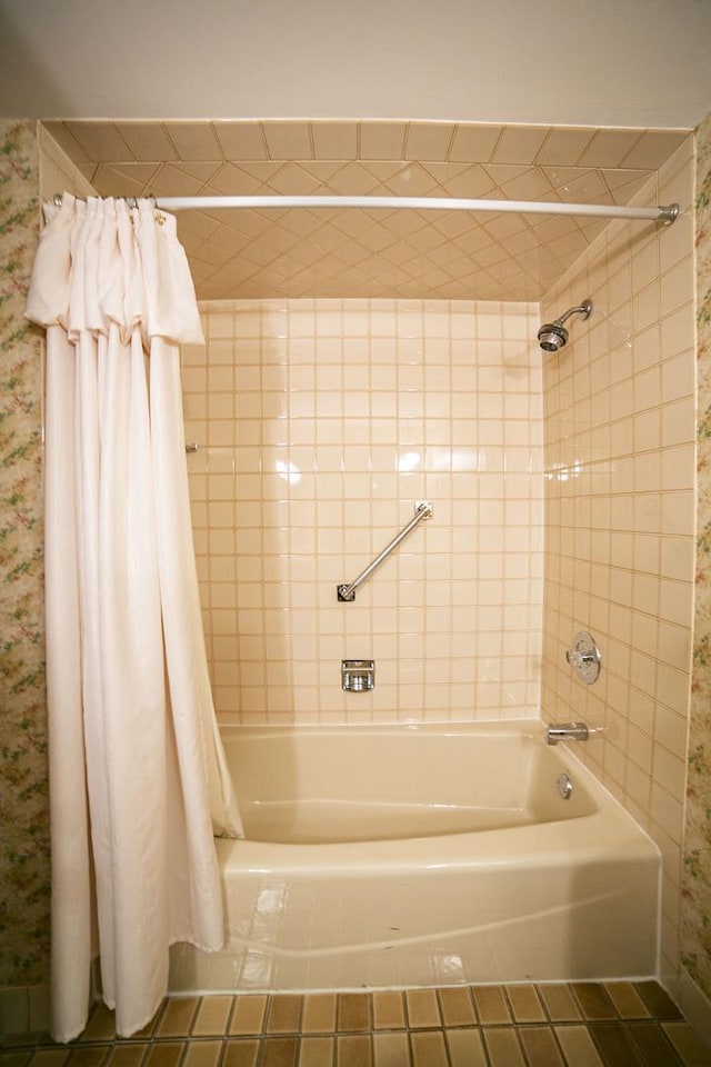 bathroom with shower / tub combo and tile patterned floors