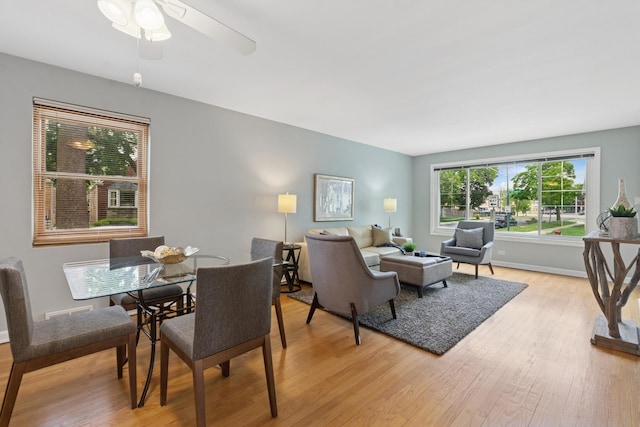 5941 N Mccook Ave, Chicago, IL 60646 - dining area with light wood-style flooring, ceiling fan, and baseboards