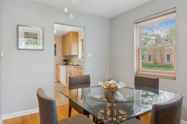 5941 N Mccook Ave, Chicago, IL 60646 - dining room featuring light wood finished floors, baseboards, and ceiling fan
